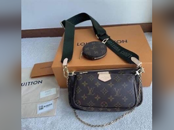 Bags  - Louis Vuitton  - Brown  - Faux Leather  - For Women