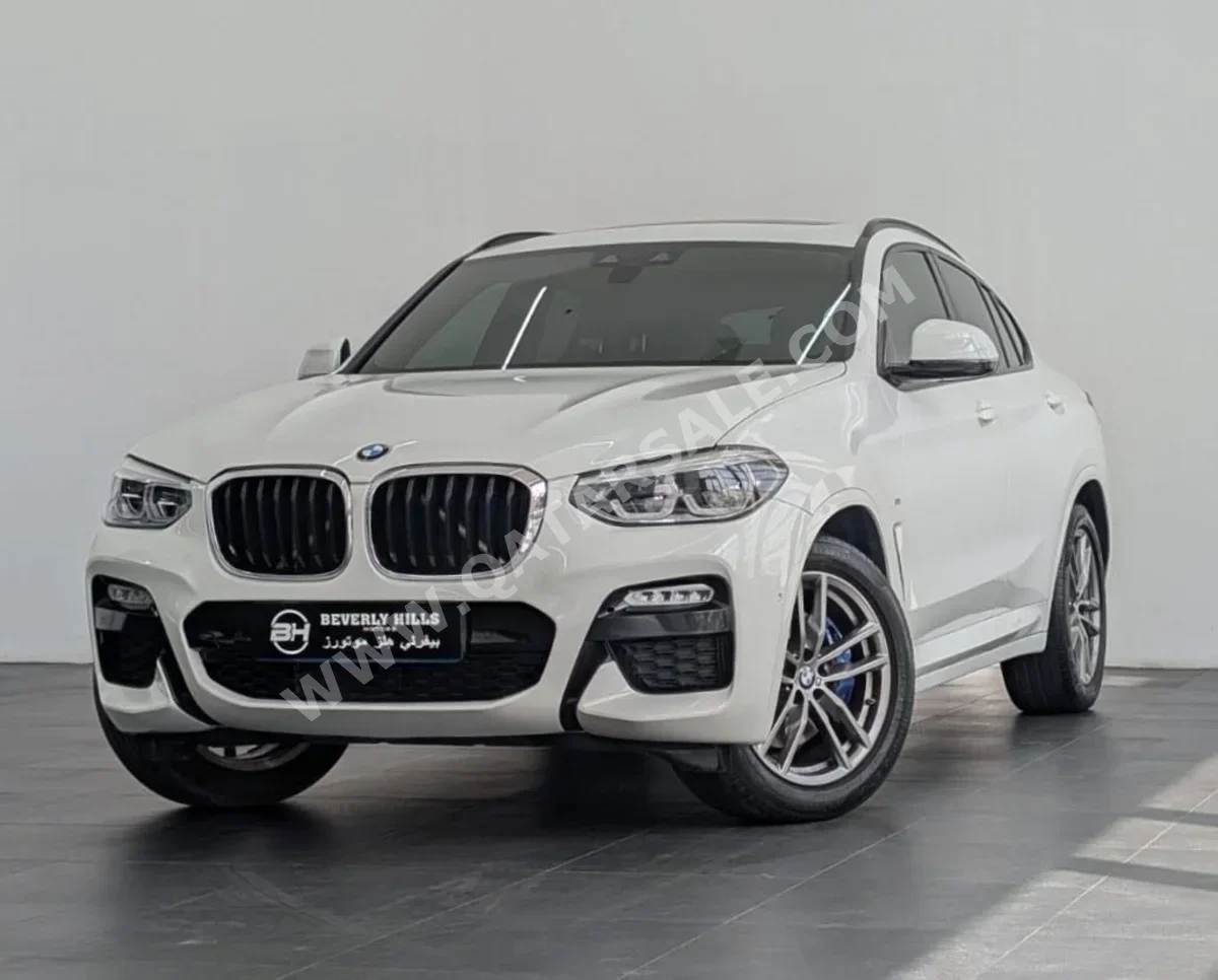 BMW  X-Series  X4 M  2019  Automatic  78,350 Km  4 Cylinder  Four Wheel Drive (4WD)  SUV  White  With Warranty