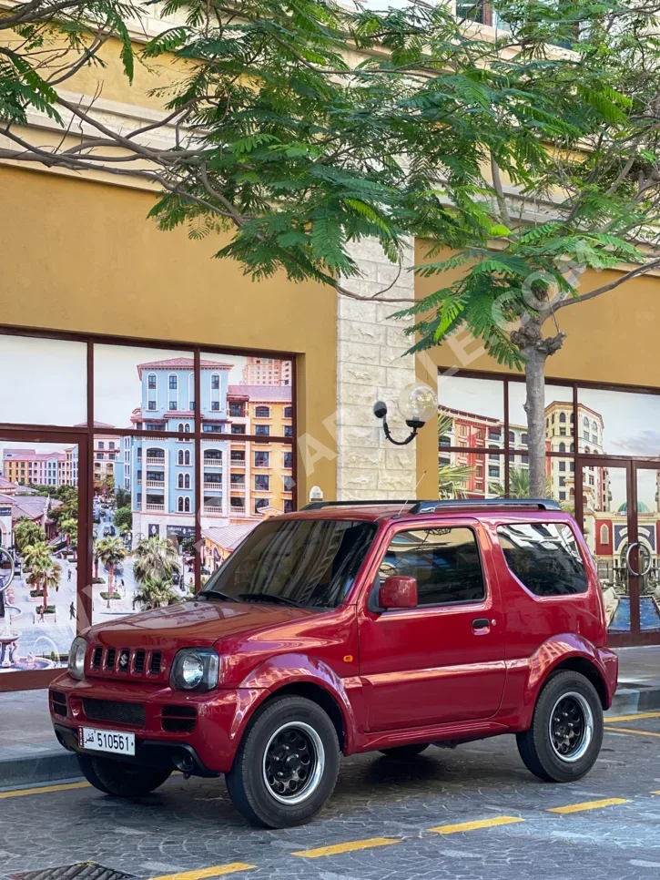 Suzuki  Jimny  2012  Manual  127,000 Km  4 Cylinder  Four Wheel Drive (4WD)  SUV  Red