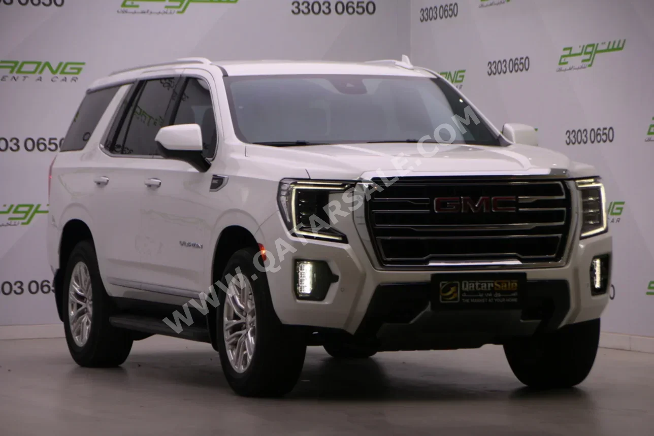 GMC Yukon SLT 2023 Automatic 56,500 Km 8 Cylinder Four Wheel Drive (4WD) SUV White With Warranty