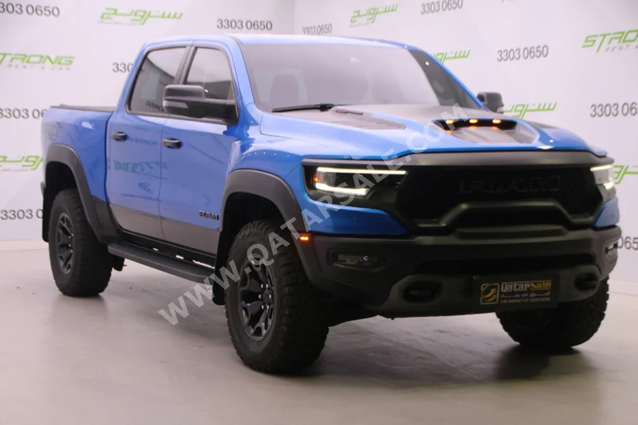 دودج رام تي أر إكس 2023 اوتوماتيك 39,000 كم 8 سلندر دفع رباعي بيكب ازرق تحت الضمان