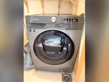 غسالة ملابس & الكل في واحد سامسونج \  غسالة تحميل أمامي  اللون الرمادي  متصلة بالواي-فاي