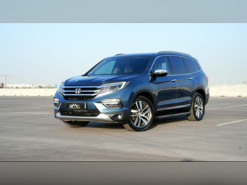 Honda  Pilot  Touring  2016  Automatic  113,000 Km  6 Cylinder  All Wheel Drive (AWD)  SUV  Blue