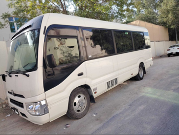 Toyota  Coaster  2023  Automatic  207,000 Km  4 Cylinder  Rear Wheel Drive (RWD)  Van / Bus  White