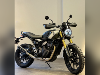 تريمف سكرامبلر 400 اكس - 2024 - اللون اخضر مطفي - الضمان