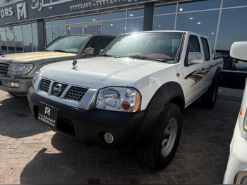 Nissan  Pickup  2006  Manual  405,000 Km  4 Cylinder  Rear Wheel Drive (RWD)  Pick Up  White