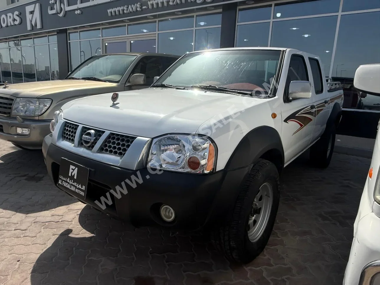 Nissan  Pickup  2006  Manual  405,000 Km  4 Cylinder  Rear Wheel Drive (RWD)  Pick Up  White