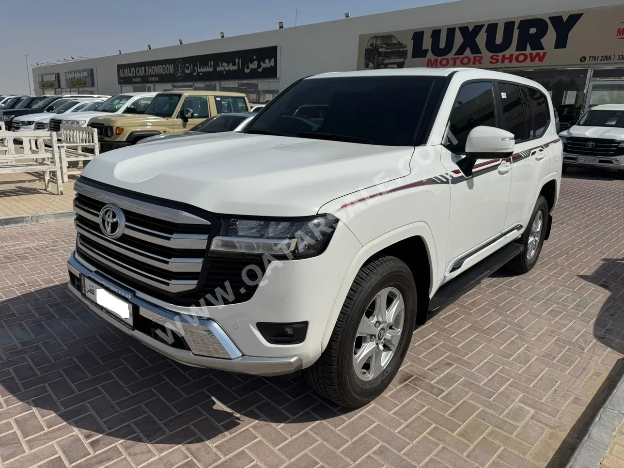تويوتا  لاند كروزر  جي اكس ار  2025  اوتوماتيك  20,000 كم  6 سلندر  دفع رباعي  اس يو في  أبيض  تحت الضمان