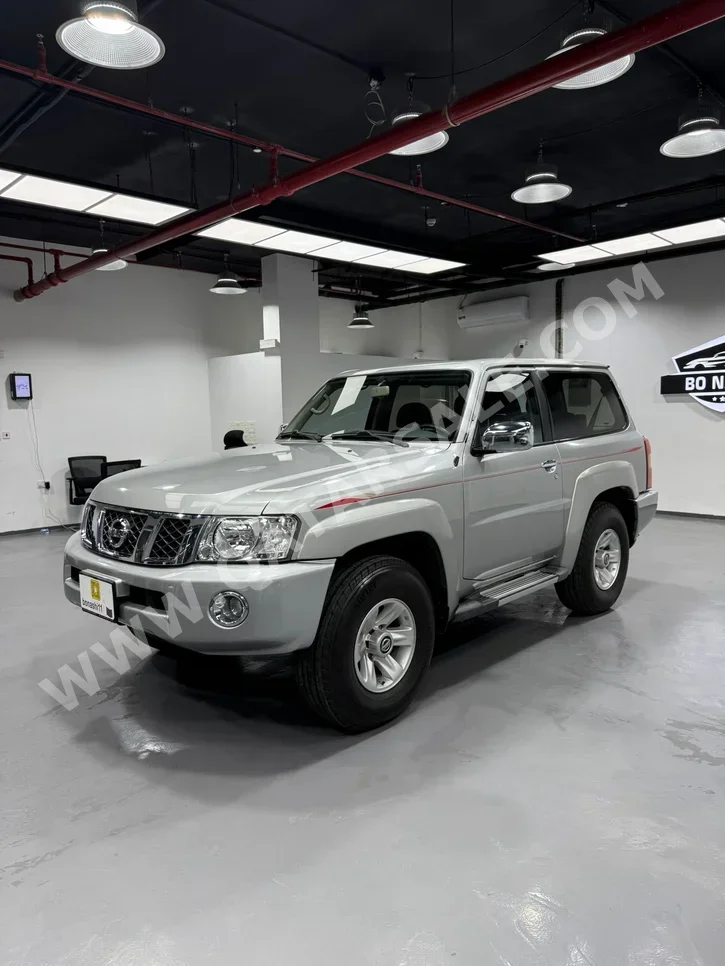 Nissan  Patrol  Safari  2021  Manual  33,688 Km  6 Cylinder  Four Wheel Drive (4WD)  SUV  Silver
