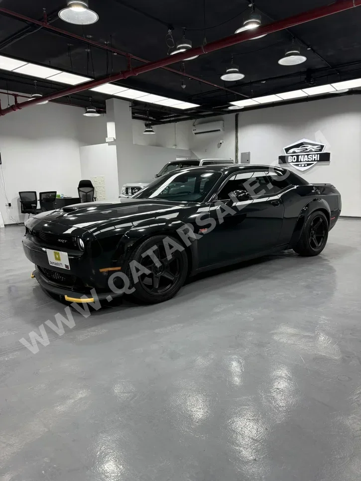 Dodge  Challenger  SRT  2015  Automatic  171,888 Km  8 Cylinder  Rear Wheel Drive (RWD)  Coupe / Sport  Black