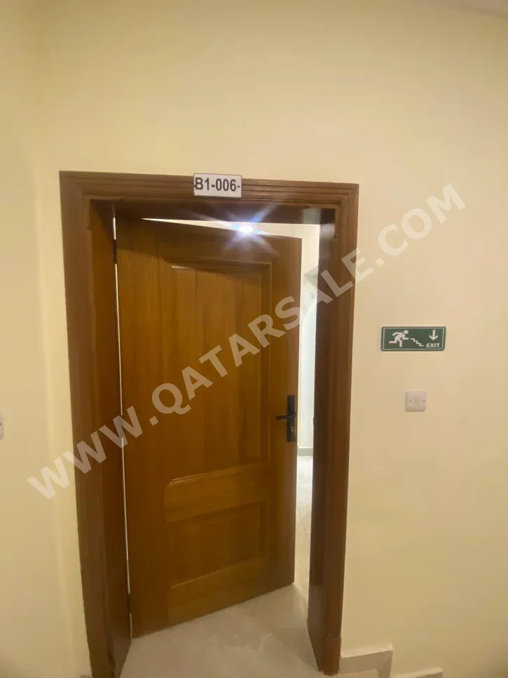 2 Bedrooms  Apartment  For Rent  in Umm Salal -  Umm Al Amad  Fully Furnished