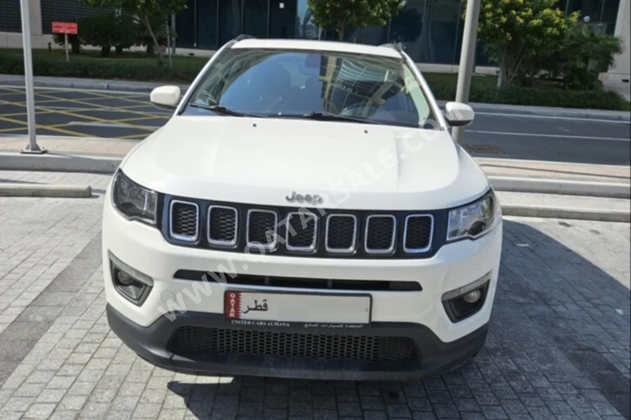 جييب  كومباس  لونغتيود  2019  اوتوماتيك  100,000 كم  4 سلندر  دفع رباعي  اس يو في  أبيض