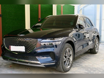 Genesis  GV 70  2024  Automatic  34,000 Km  4 Cylinder  All Wheel Drive (AWD)  SUV  Dark Blue  With Warranty