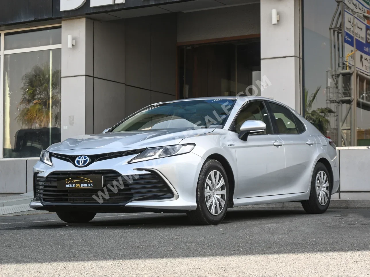 Toyota  Camry  Hybrid  2022  Automatic  310,000 Km  4 Cylinder  Front Wheel Drive (FWD)  Sedan  Silver