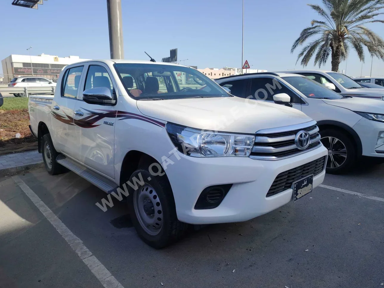 Toyota  Hilux  SR5  2022  Automatic  117,000 Km  4 Cylinder  Four Wheel Drive (4WD)  Pick Up  White