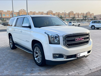 GMC  Yukon  XL  2015  Automatic  234,000 Km  8 Cylinder  Four Wheel Drive (4WD)  SUV  White