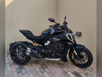 دوكاتي  ديافيل في4 -  2025 - اللون اسود -  الضمان