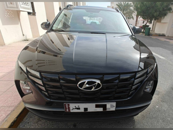Hyundai  Tucson  Deluxe  2022  Automatic  76,000 Km  4 Cylinder  Front Wheel Drive (FWD)  SUV  Black  With Warranty