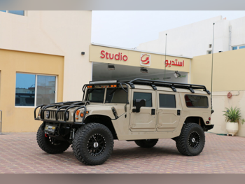 Hummer  H1  LS3 Engine  2000  Automatic  50,000 Km  8 Cylinder  Four Wheel Drive (4WD)  SUV  Beige