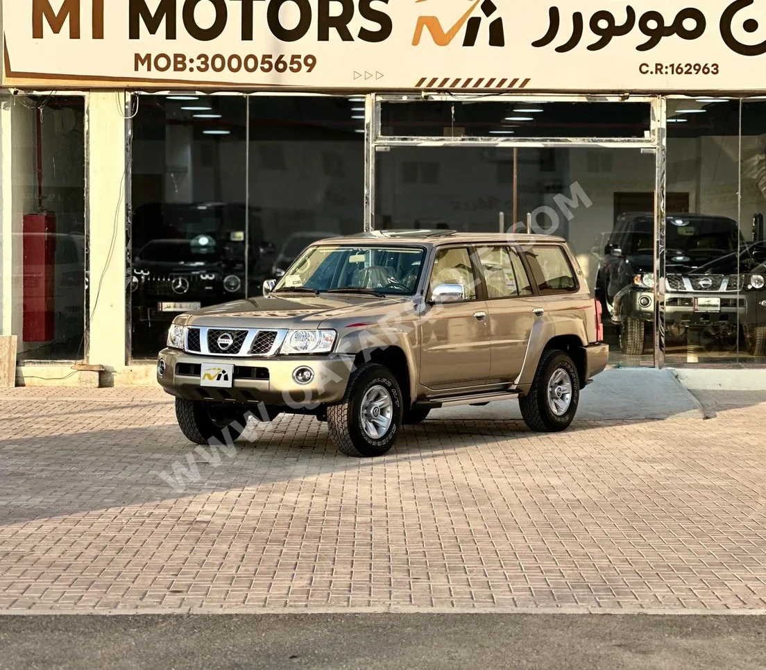 Nissan  Patrol  Safari  2024  Manual  0 Km  6 Cylinder  Four Wheel Drive (4WD)  SUV  Silver  With Warranty