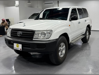Toyota  Land Cruiser  G  2006  Automatic  355,000 Km  6 Cylinder  Four Wheel Drive (4WD)  SUV  White