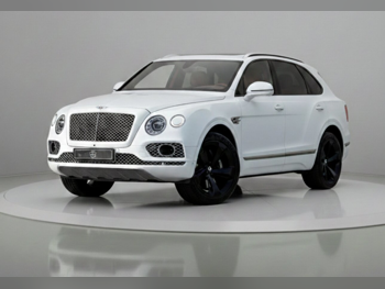 Bentley  Bentayga  Mulliner  2017  Automatic  85,000 Km  12 Cylinder  All Wheel Drive (AWD)  SUV  White  With Warranty