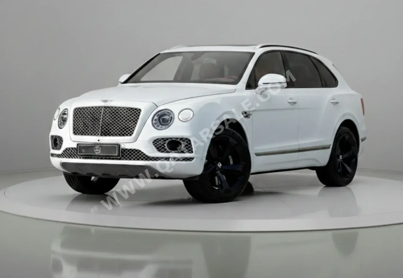 Bentley  Bentayga  Mulliner  2017  Automatic  85,000 Km  12 Cylinder  All Wheel Drive (AWD)  SUV  White  With Warranty