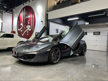 Mclaren  MP4  2013  Automatic  50,000 Km  8 Cylinder  Rear Wheel Drive (RWD)  Coupe / Sport  Gray