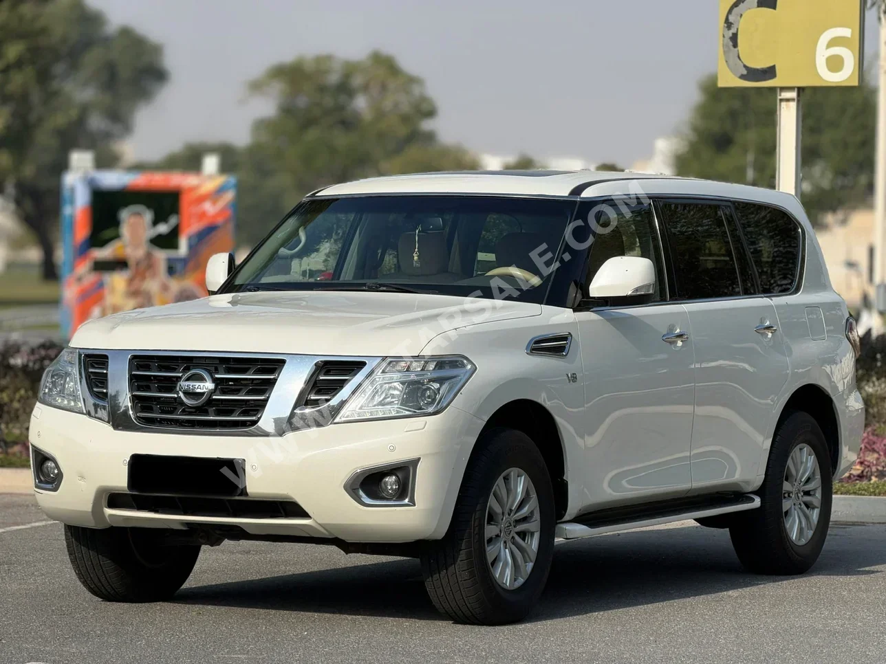 نيسان  باترول  اس اي  2015  اوتوماتيك  310,000 كم  8 سلندر  دفع رباعي  اس يو في  أبيض