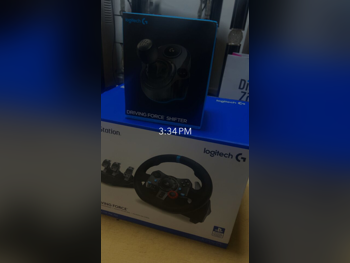 ملحقات اجهزة العاب الفيديو عجلة القيادة مع مغير السرع  - لوجيتك  - جي 29  - أسود