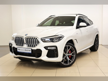 BMW  X-Series  X6 40i  2022  Automatic  52,800 Km  6 Cylinder  All Wheel Drive (AWD)  SUV  White  With Warranty