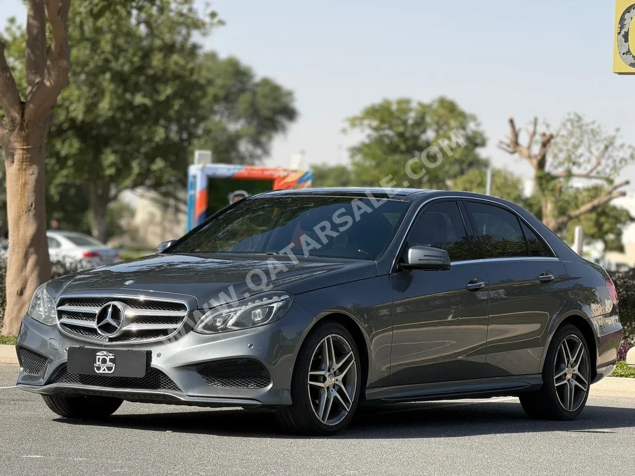 Mercedes-Benz  E-Class  400  2016  Automatic  176,000 Km  6 Cylinder  Rear Wheel Drive (RWD)  Sedan  Gray