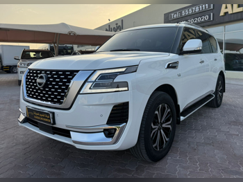 Nissan  Patrol  Titanium  2023  Automatic  47,000 Km  8 Cylinder  Four Wheel Drive (4WD)  SUV  White  With Warranty