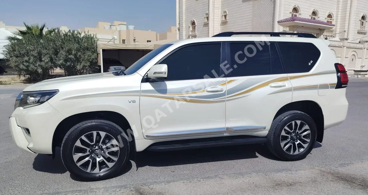 Toyota  Prado  TXL  2023  Automatic  63,000 Km  6 Cylinder  Four Wheel Drive (4WD)  SUV  White  With Warranty