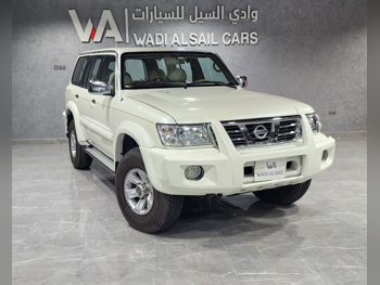 Nissan  Patrol  Super Safari  2004  Automatic  332,000 Km  6 Cylinder  Four Wheel Drive (4WD)  SUV  White