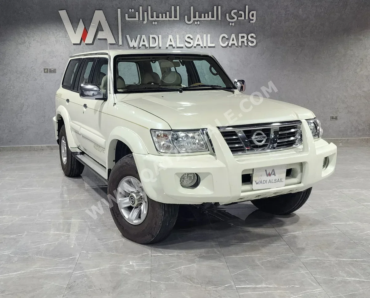 Nissan  Patrol  Super Safari  2004  Automatic  332,000 Km  6 Cylinder  Four Wheel Drive (4WD)  SUV  White