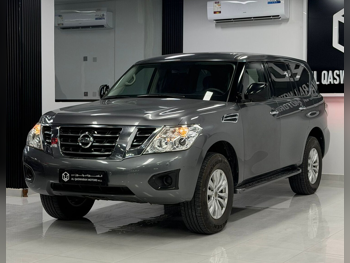 Nissan  Patrol  XE  2019  Automatic  131,000 Km  6 Cylinder  Four Wheel Drive (4WD)  SUV  Gray