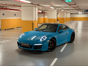 Porsche  911  Carrera GTS  2018  Automatic  49,000 Km  6 Cylinder  Rear Wheel Drive (RWD)  Coupe / Sport  Blue  With Warranty