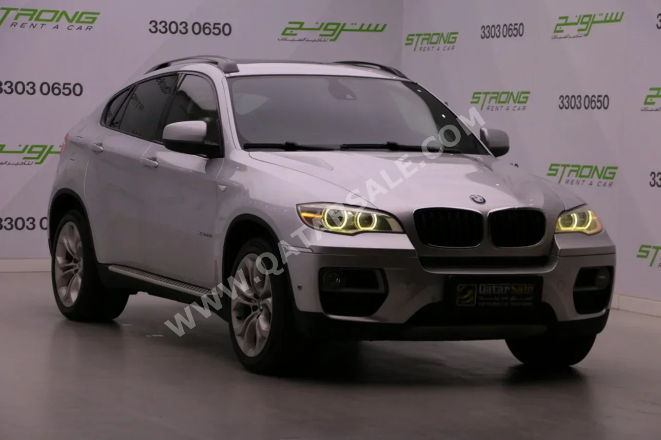 بي ام دبليو  الفئة - اكس  اكس 6  2014  اوتوماتيك  130,000 كم  6 سلندر  دفع رباعي  اس يو في  فضي