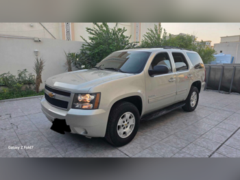 Chevrolet  Tahoe  LS  2014  Automatic  277,000 Km  8 Cylinder  Rear Wheel Drive (RWD)  SUV  Gold