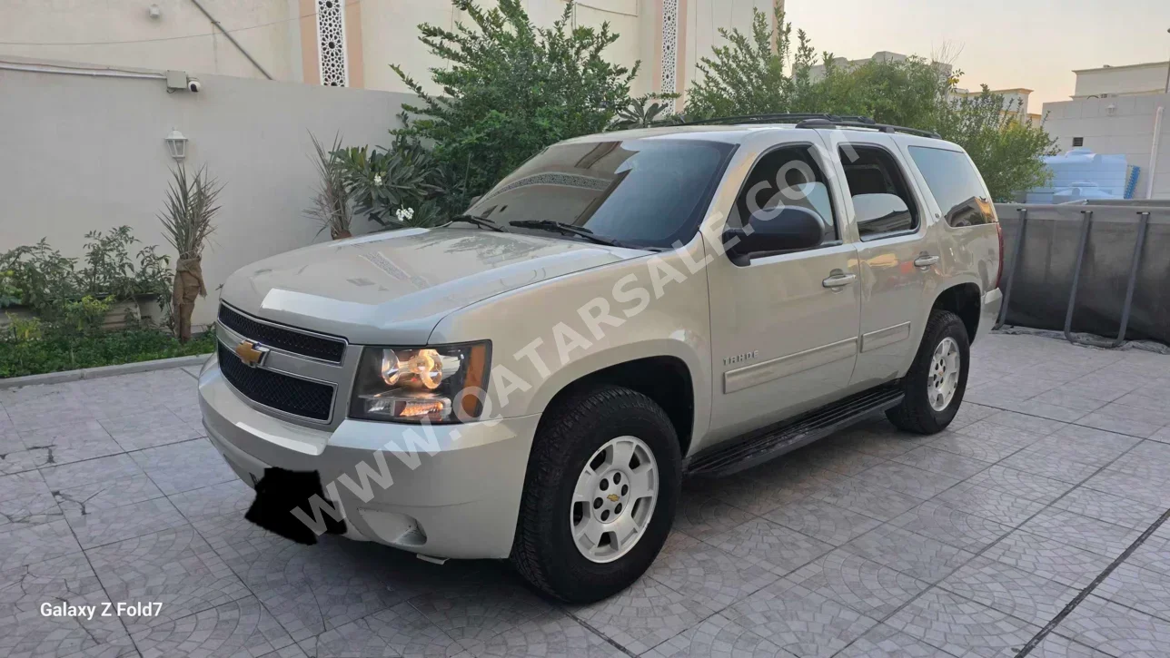 Chevrolet  Tahoe  LS  2014  Automatic  277,000 Km  8 Cylinder  Rear Wheel Drive (RWD)  SUV  Gold