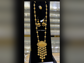 Gold Set  Bahrain  Woman  By Item ( Designers )  Without Stone  Maintenance Warranty  Special Stylish Package  Free Shipping  Yellow Gold  21k