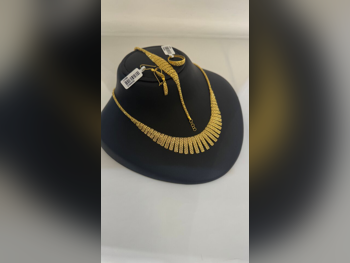 Gold Set  Bahrain  Woman  By Weight  Without Stone  Maintenance Warranty  Free Shipping  Yellow Gold  21k