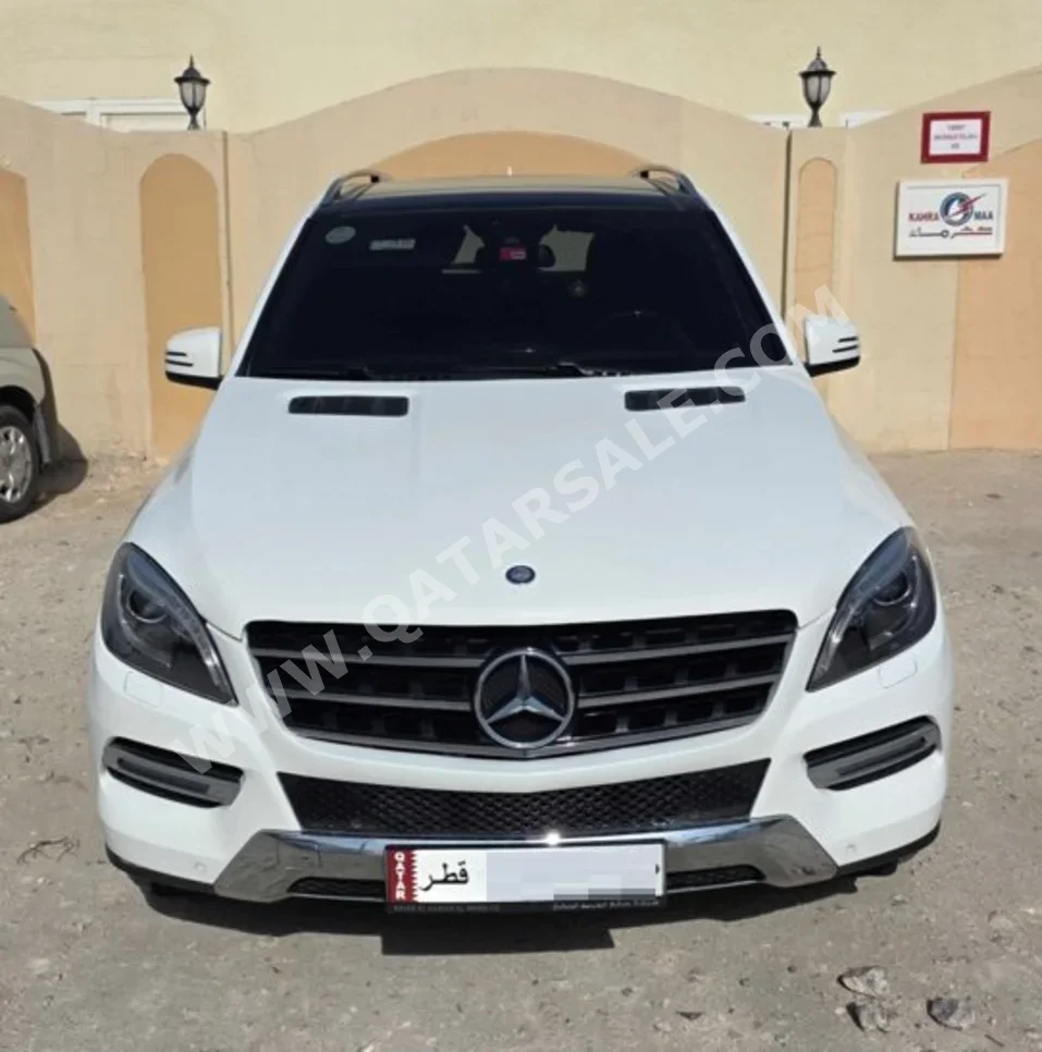 مرسيدس - بنز  ام ال  400  2015  تبترونك  138,500 كم  6 سلندر  دفع كلي مستمر  اس يو في  أبيض