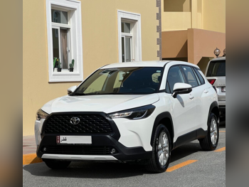 Toyota  Corolla  Cross Hybrid  2023  Automatic  48,000 Km  4 Cylinder  Rear Wheel Drive (RWD)  SUV  White  With Warranty