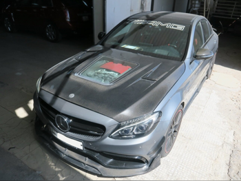مرسيدس - بنز  سي - كلاس  63 AMG  2016  اوتوماتيك  89,000 كم  8 سلندر  دفع خلفي  سيدان  رمادي
