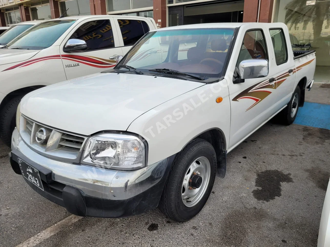 Nissan Pickup 2009 Automatic 595,000 Km 4 Cylinder Rear Wheel Drive (RWD) Pick Up White