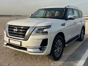 Nissan Patrol Platinum 2021 Automatic 83,000 Km 6 Cylinder Four Wheel Drive (4WD) SUV White With Warranty — image 1