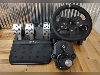 ملحقات اجهزة العاب الفيديو عجلة القيادة مع مغير السرع  - لوجيتك  - جي 29  - أسود