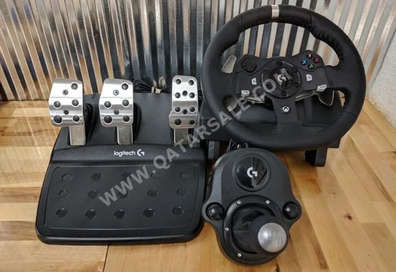 ملحقات اجهزة العاب الفيديو عجلة القيادة مع مغير السرع  - لوجيتك  - جي 29  - أسود